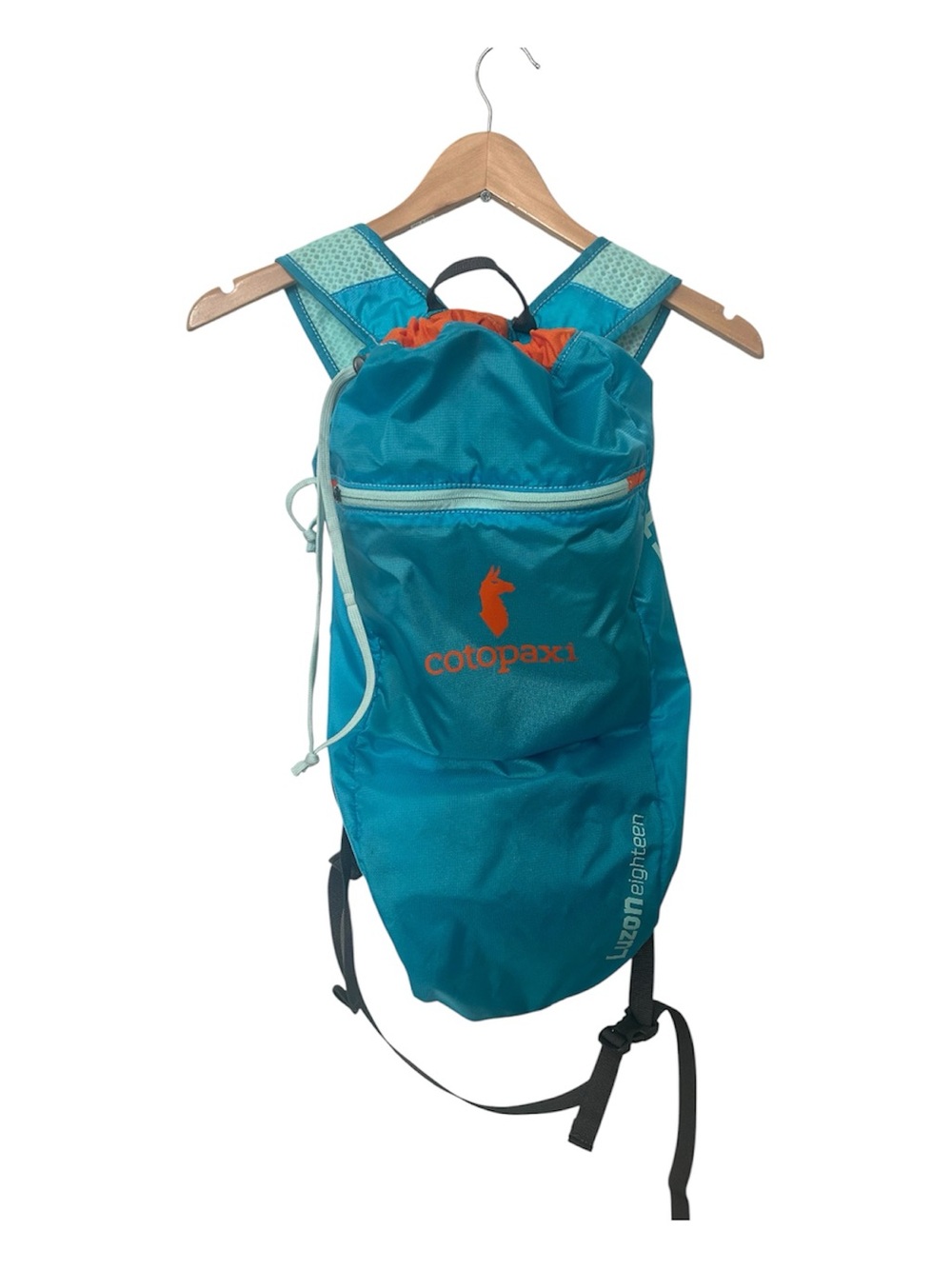 cotopaxi aqua blue daypack with light teal logo